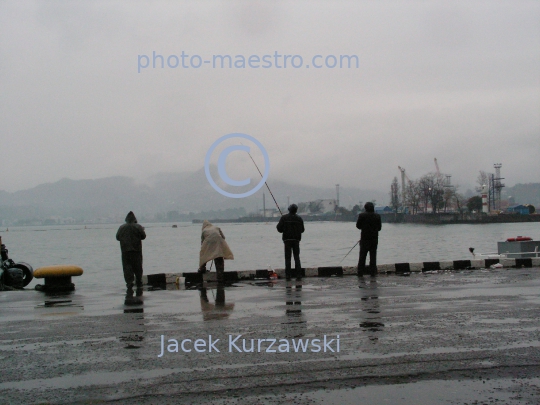 Georgia,Batumi,city center,architecture,buildings,port,harbour,boulvard,twilight,rainy weather,fishing people,Black Sea