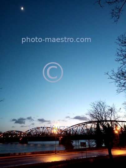 Poland,Torun,Kuyavian-Pomeranian Voivodeship,architecture,Old Town,panoramical view,Vistula,bridge,twilight,ilumination,moon